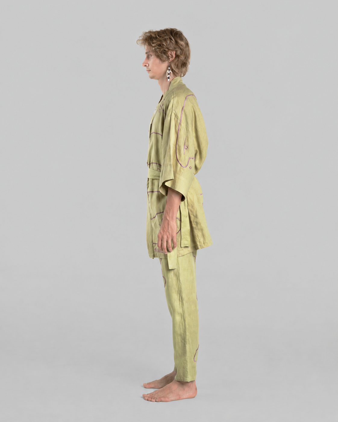 Green Goblin kimono set, side view on a model against a neutral grey background