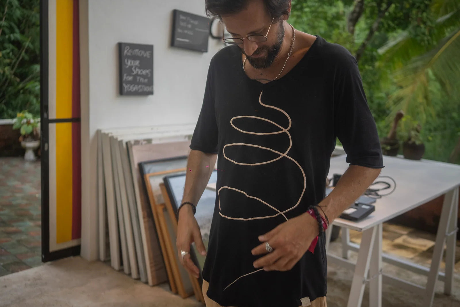 A finished shirt with a single embroidered spiral