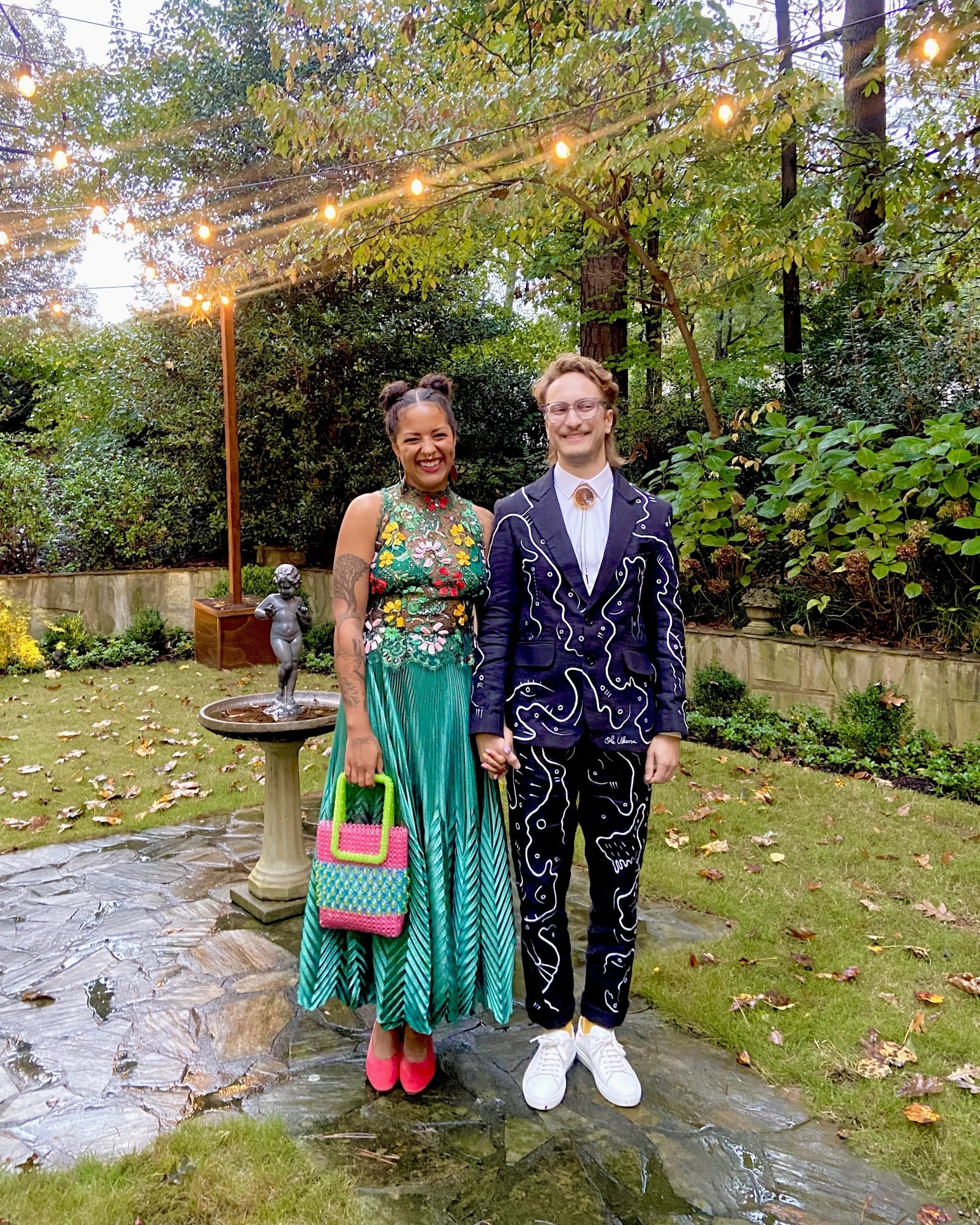 Forrest and Michelle together outdoors, with Forrest wearing the UKENA suit