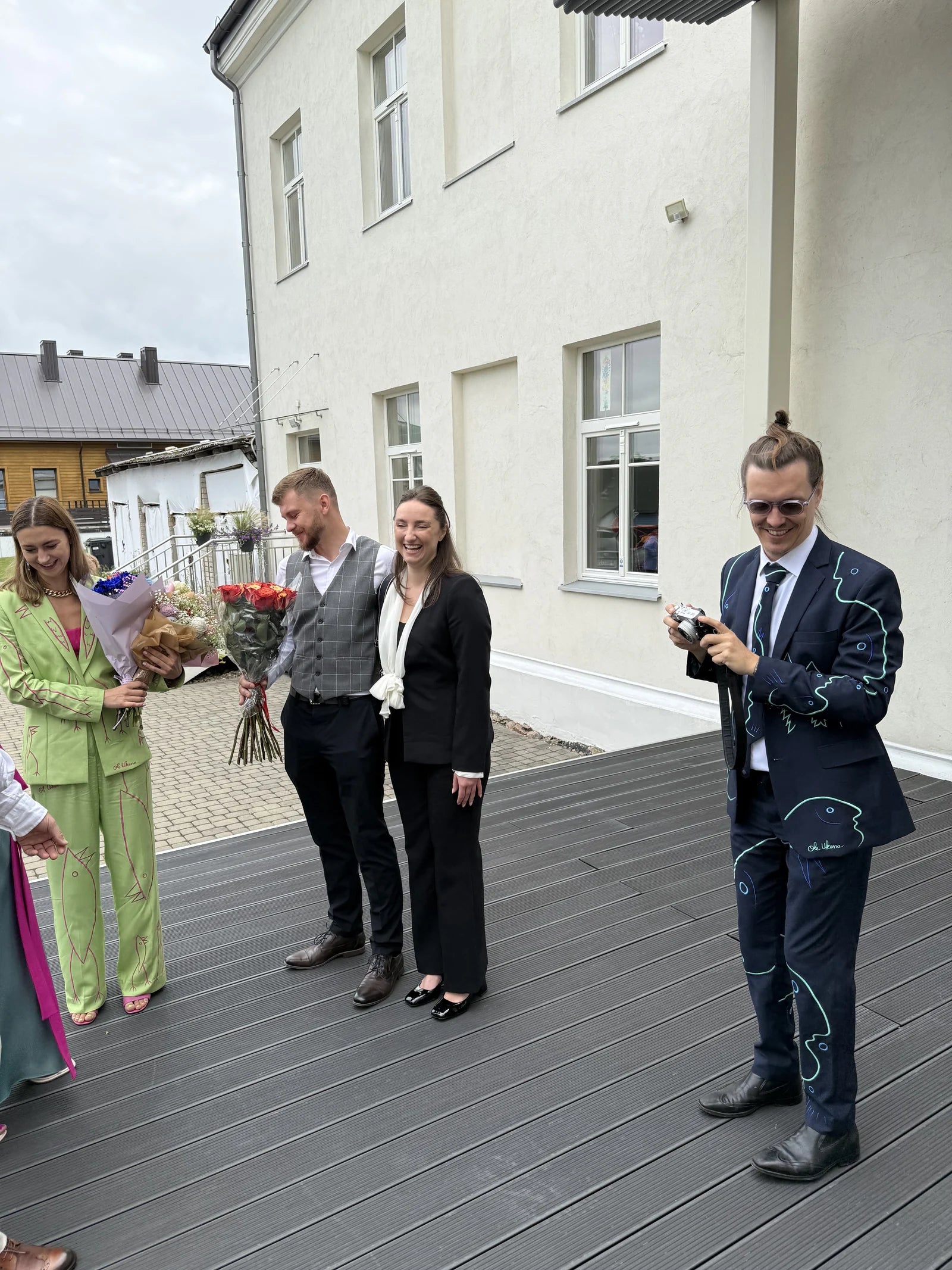 Ole in a custom navy UKENA suit during the family wedding celebration